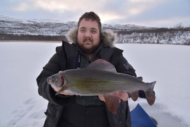 Abisko: Ice Fishing Experience - The 2-hour rhythm on the ice: drilling holes, setting up, and reading the water