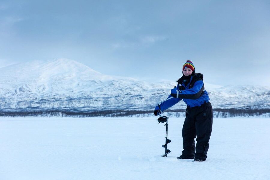 Abisko: Lake Torneträsk Arctic Ice Fishing Trip - Your fishing setup: drill a hole, drop your lure, and wait
