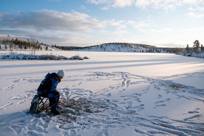 Arctic Fishing & Open Fire Cooking - A Day at Rahajärvi: Traditional Lappish Ice Fishing Meets Fire-Cooked Fish