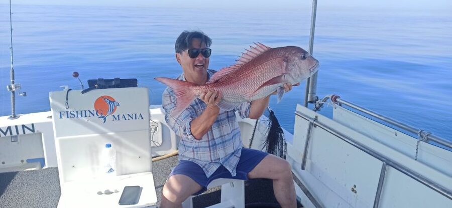 Athens: Fishing Trip Experience on a Boat with Seafood Meal - Entering the Saronic Gulf with Captain Nektarios’ boat vibe