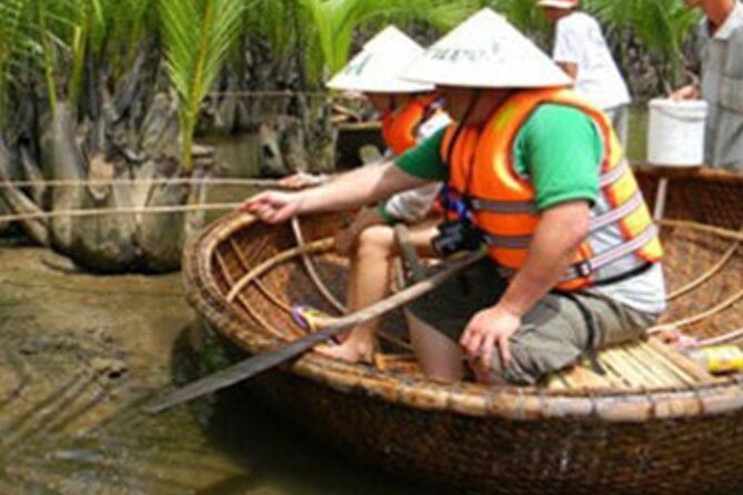 Basket Boat in Hoi An( visit water coconut forest,Crab fishing ) - Meeting the family at the water coconut village: more than a photo stop