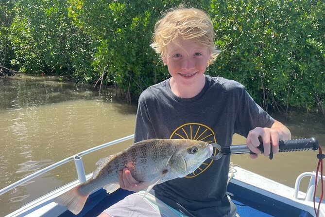 Cairns Estuary Fishing - Wildlife on the move: mangroves, channels, and crocodile spotting