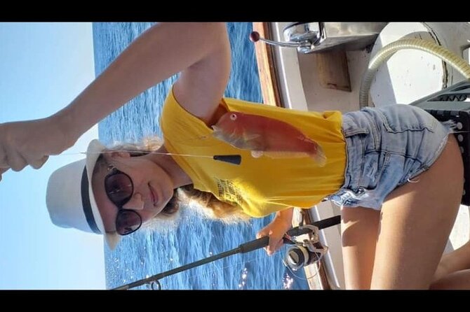 Captain Manolis Fishing with barbecue on the boat - Who Capt. Manolis Is Helping You Be With on the Water