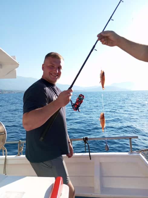 Chania: Fishing Boat Trip with Breakfast and Swim - Switching spots: why the boat travels during the trip