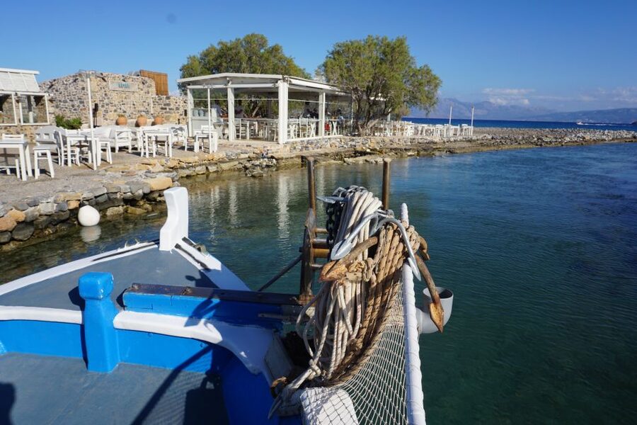 Crete: Fishing & Swimming Boat Cruise with Lunch & Drinks - Sea caves, snorkeling stops, and the calmer-water feel