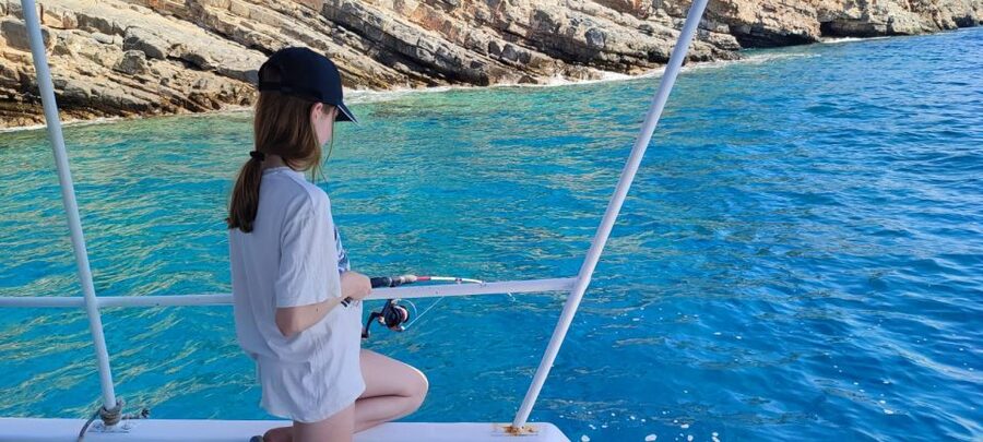Crete: Fishing & Swimming Boat Cruise with Lunch & Drinks - Lunch aboard: fresh fish, Greek salad, and drinks that feel included for a reason