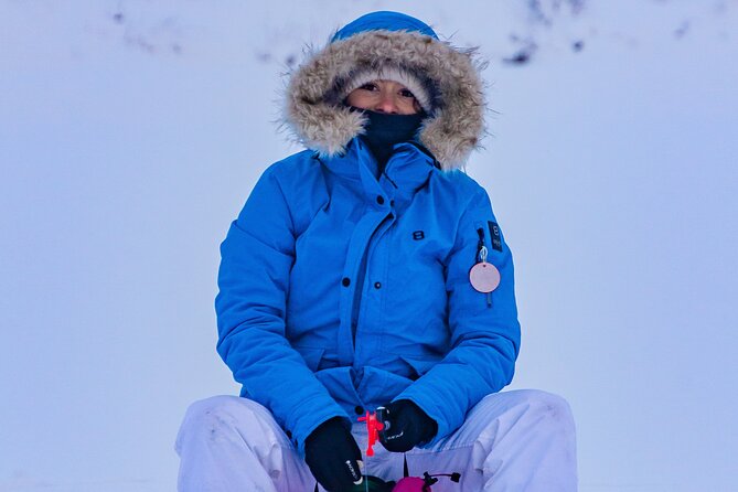 First Ice Fishing Experience in Rovaniemi - Snacks around the open fire: the best reason to keep fishing