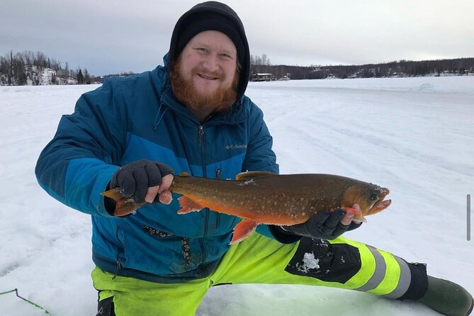 Guided Ice Fishing Excursions - On-ice setup: warm tent, holes drilled, and learning that starts fast