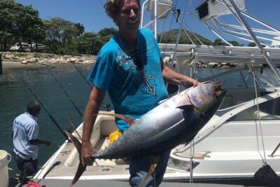 Half Day Big Game Fishing private charter - The Boat: Trojan 34 ft, Twin 400HP, and Why It Matters
