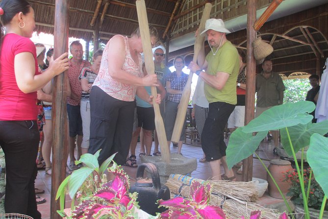 Hoi An Farming and Fishing life Experience Tour - Stop at Tra Que organic village: hands-on farming without being too touristy
