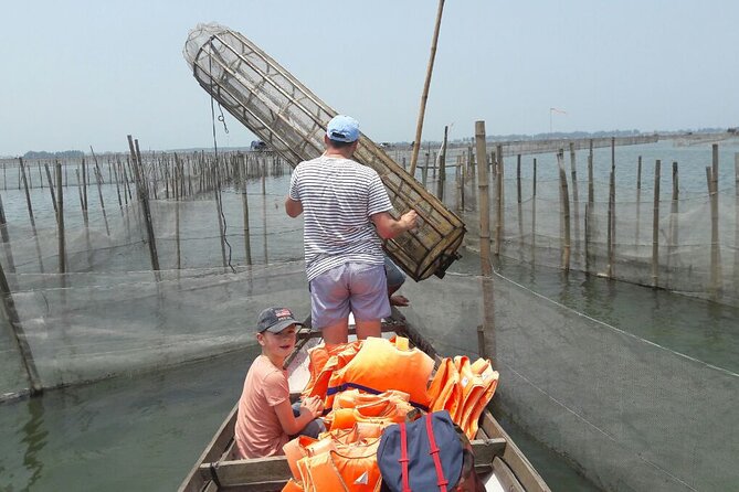 Hue Motorcycle Tour with Fishing: Best Unique Day Trips in Hue - Thanh Toan Bridge: a covered bridge built by a woman’s personal money