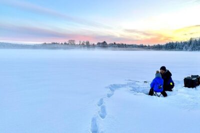 Ice Fishing in Rovaniemi - On the Ice: Cutting the Hole and Learning the Basics