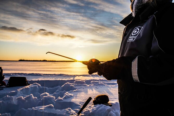Ice Fishing on a Frozen Lake in Levi - Drilling the ice and fishing: how the “hole strategy” really works