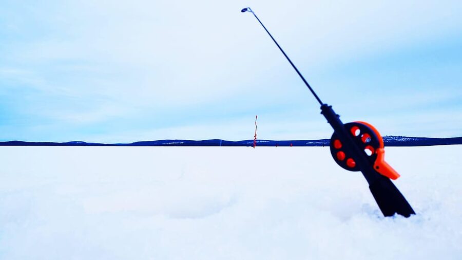 Ice fishing program in Lapland - Fishing on a Frozen Lake: What You’ll Feel While You Wait