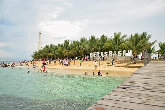 Langkawi Jet Ski Fishing Tour with Guide - Langkawi Port to Awana Porto Malai: eagle statue, cruise ships, and harbor drama