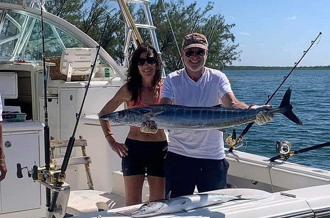 Luxury Private Fishing Charters - FULL DAY CHARTER - Sting Ray City and reef time: how many people turn this into a full Cayman day