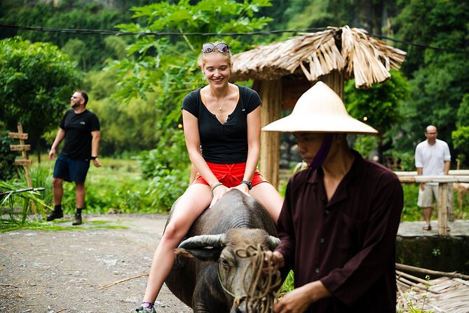 Ninh Binh eco group tour - Buffalo riding, rice planting, fishing - Buffalo Cave and Tam Coc: starting in a UNESCO natural setting