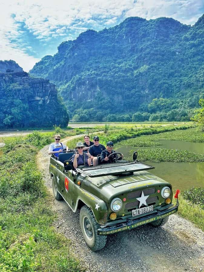 Ninh Binh Jeep Adventure: Temples, Lotus, Fishing & Cooking - Lotus Pond Photo Break (Best May to August)