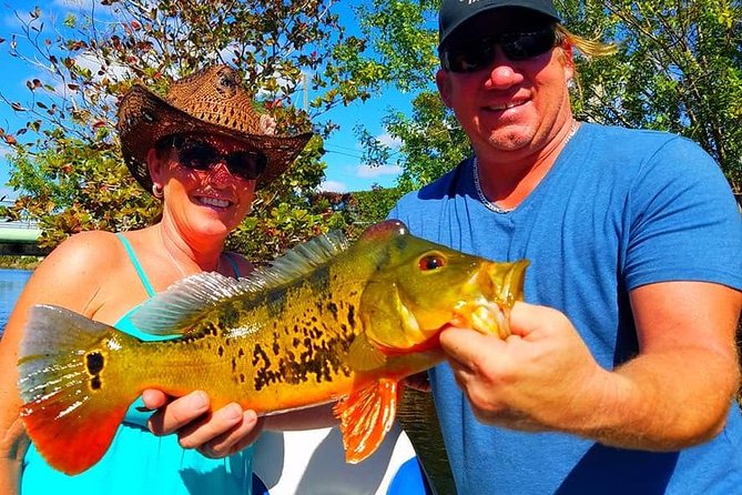 Peacock Bass Fishing Trip in Boynton Beach - Golf greens along the path: a small bonus if you like to look around