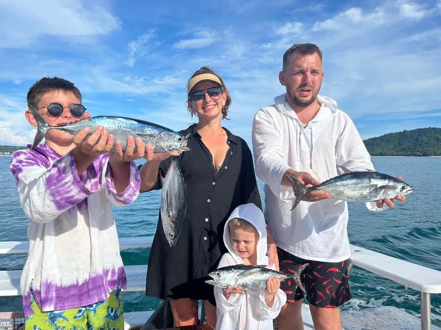 Phuket: Racha Island Fishing and Snorkeling Boat Tour - Snorkeling in the clear Andaman Sea waters at Racha Islands