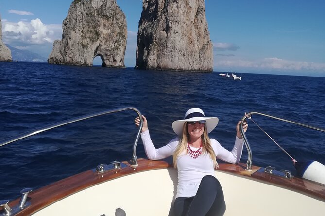 Private tour with fishing, tour of Capri and lunch on board - Grotta stops from the boat: White Grotta, Green Grotta, and Grotta dei Santi
