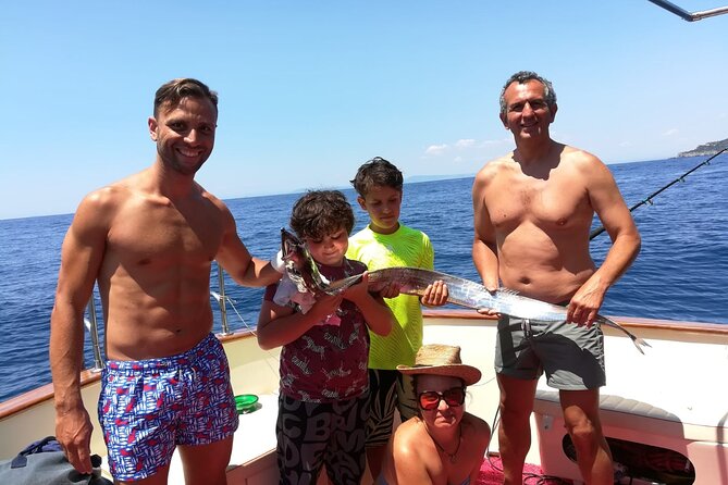 Private tour with fishing, tour of Capri and lunch on board - Coast cruise with legends along Massa Lubrense