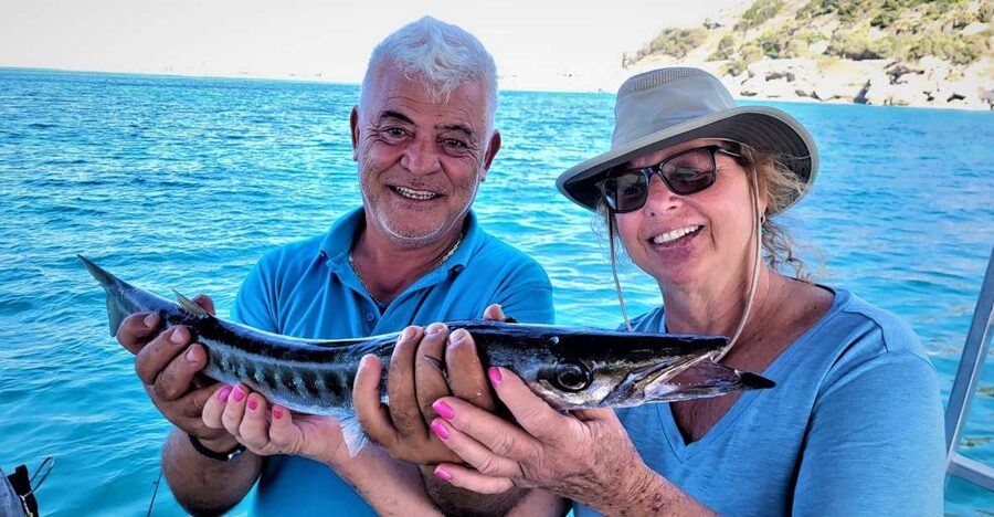Rhodes: Fishing Trip, Snorkelling, BBQ, & Professional Guide - Cruise time from Rhodes: choosing Kallithea Springs, Santa Marina, or a sandy bay