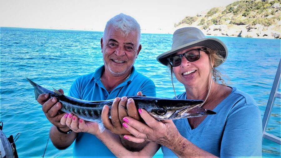 Rhodes: Fishing Trip, Snorkelling, BBQ, & Professional Guide - Bottom fishing near the seabed: where the effort turns into results