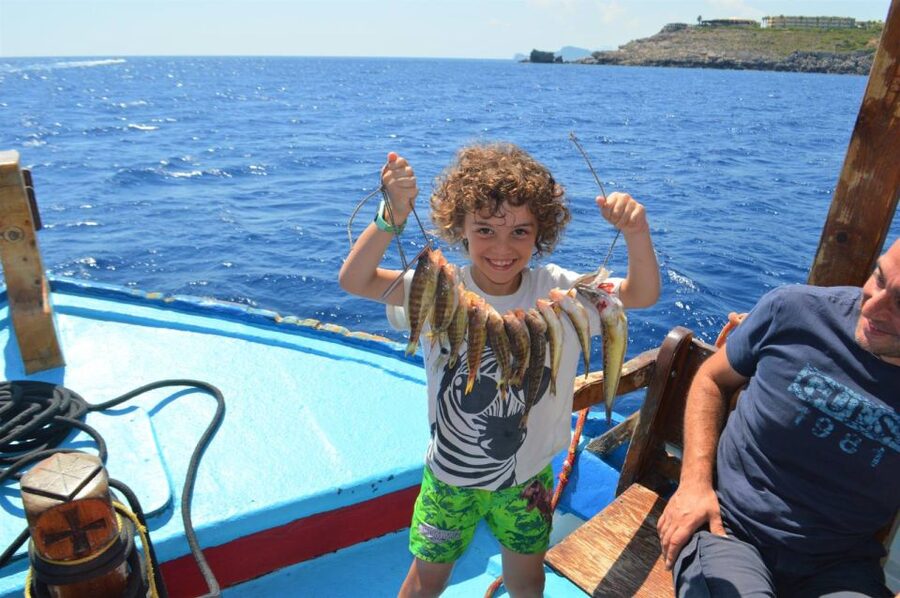 Rhodes Town: Fishing Boat Trip with Fish Meal and Swim Stops - Key things that make this trip worth your time