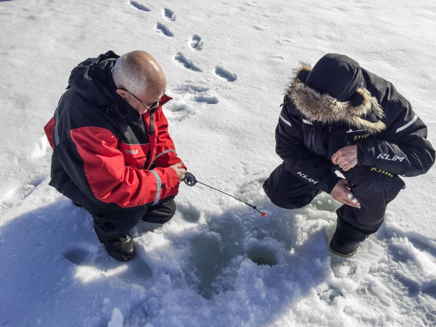 Rovaniemi: Arctic Circle Ice Fishing Experience - Warm Up by the Campfire: Hot Juice, Sausages, and the Frozen-Lake Mood