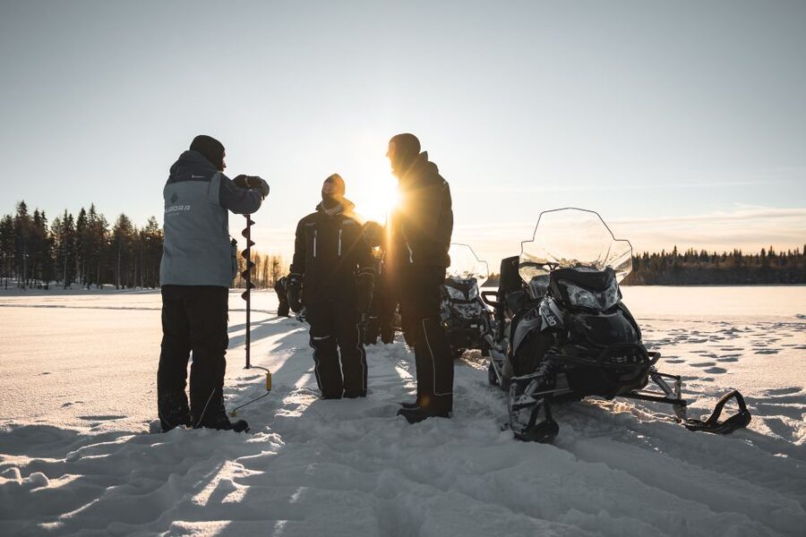 Rovaniemi: Electric Snowmobile Safari Tour with Ice Fishing - Pickup in Rovaniemi and getting kitted for real winter