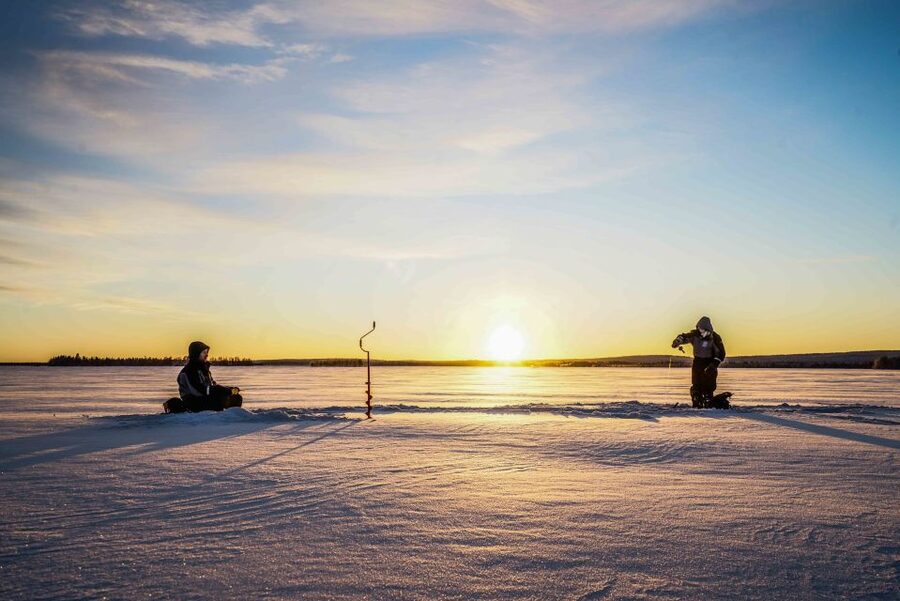 Rovaniemi: Ice Fishing on a Frozen Lake with BBQ and Photos - Ice-Fishing Basics: What You Do Under a Meter of Ice