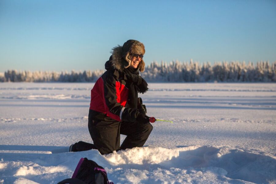 Ruka: Ice fishing trip - Drilling the hole and learning the rod setup