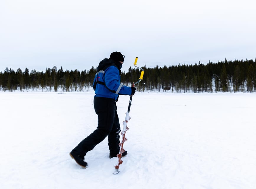 Saariselkä: Ice Fishing Safari by Snowmobile - Ice-fishing lessons that start with drilling a safe hole