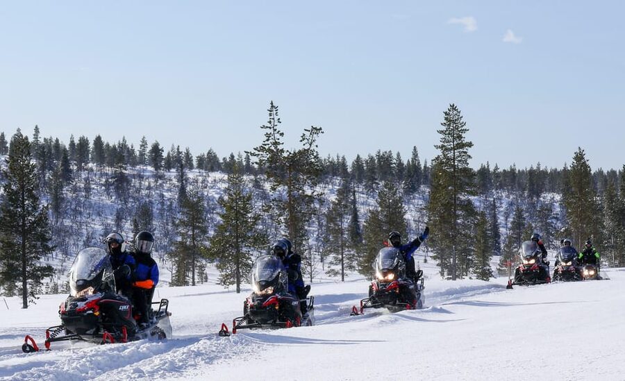 Saariselkä: Ice Fishing Safari by Snowmobile - Driving through Saariselkä’s winter forests and open fells