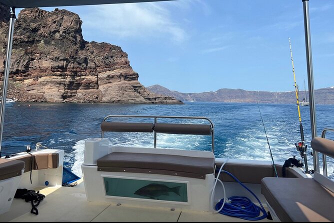Santorini Fishing Private Cruise boat tour - BBQ, Snorkeling - Snorkeling and swim stops in secluded coves (not just one quick dip)