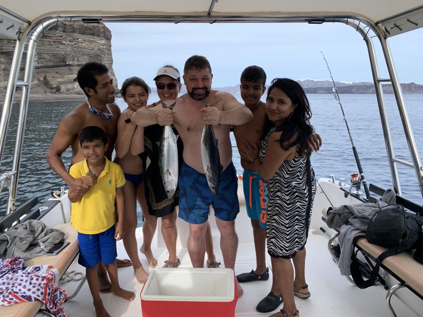 Santorini Private Cruise boat fishing tour - BBQ, Snorkeling - Watching the Oia sunset from the water