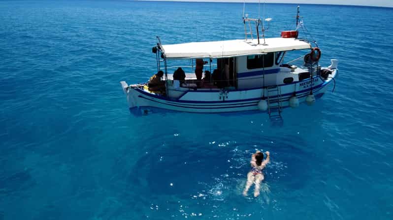 Sfakia fishing trip daytime - What you eat on the boat: fish, soup, salad, wine, raki, fruit
