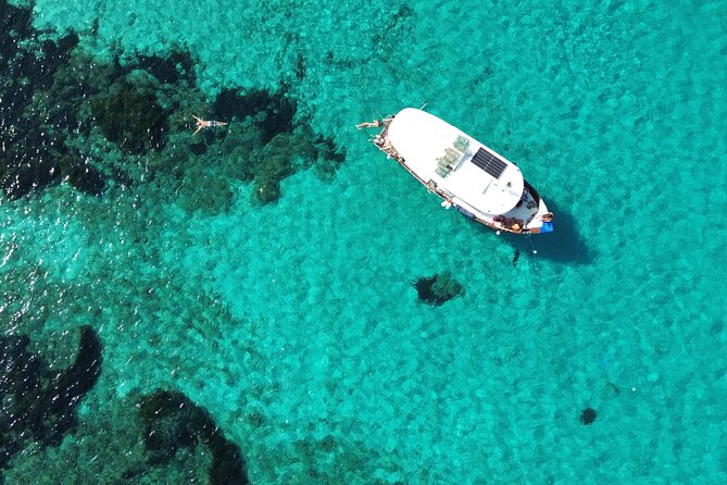 Snorkeling and Diving in the Gulf of Tavolara with Fishing - A Small-Group Boat Day in the Gulf of Tavolara