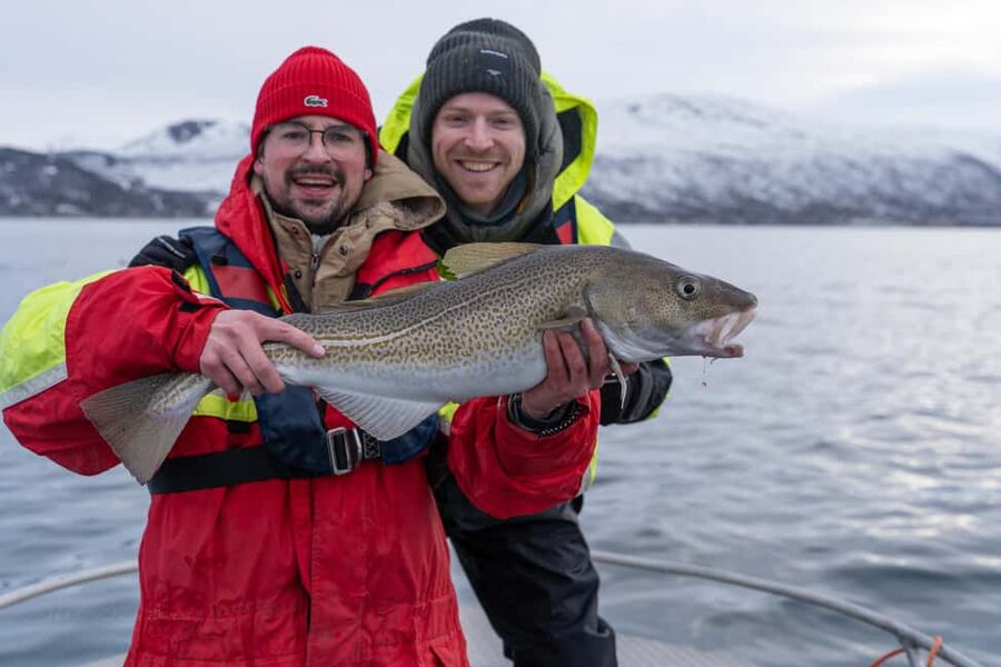 Tromsø: Private Fishing Tour - Entering the day at Skattøra Marina: suits, life jackets, and Captain Paulis