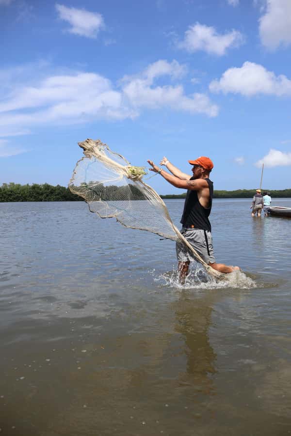 Typical lunch on beach, mangrove tour & fishing with natives - Drums, culture, and that calm after the work is done